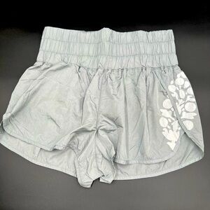 Women’s free people movement grey and white shorts‎ size large 2” inseam